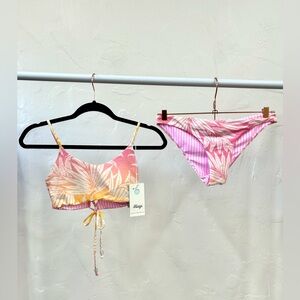 Medium Maaji women’s reversible bikini top and bottom.